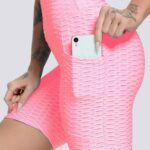 Calções desportivos modeladores com efeito push-up e bolsos