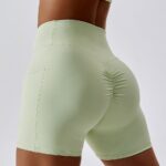 Calções desportivos push-up com bolsos laterais