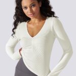Top desportivo de manga comprida com efeito push-up