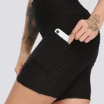 Calções desportivos modeladores com efeito push-up e bolsos