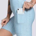 Calções desportivos modeladores com efeito push-up e bolsos