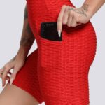 Calções desportivos modeladores com efeito push-up e bolsos